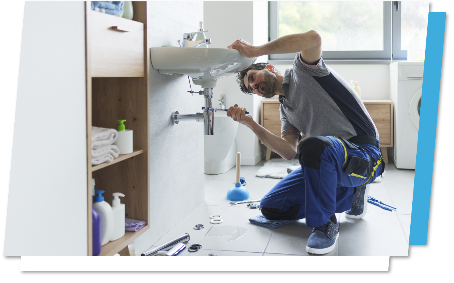 Bovard plumbing expert servicing a bathroom sink.